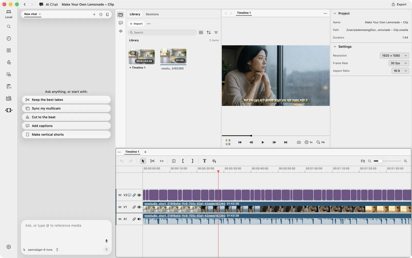 The VoxStudio video editor showing an AI chat panel, the media library, a preview, and a timeline with a subtitle track above the video and audio tracks.